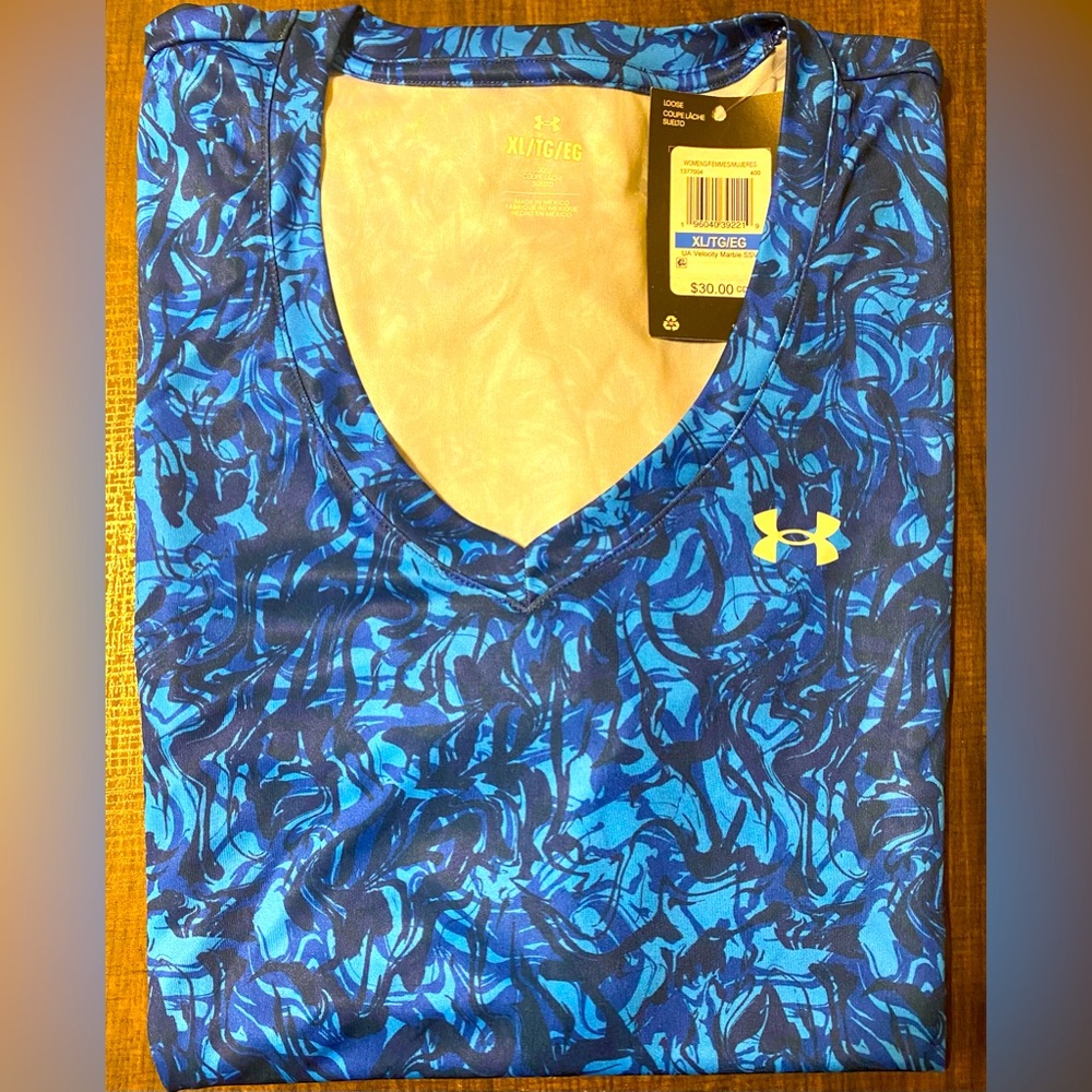 New with tags Women’s Under Armour shirt (X-Large)